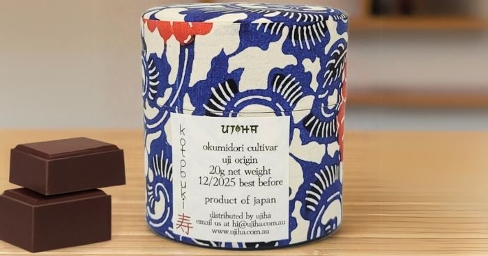 Kotobuki matcha with 2 blocks of chocolate on a table